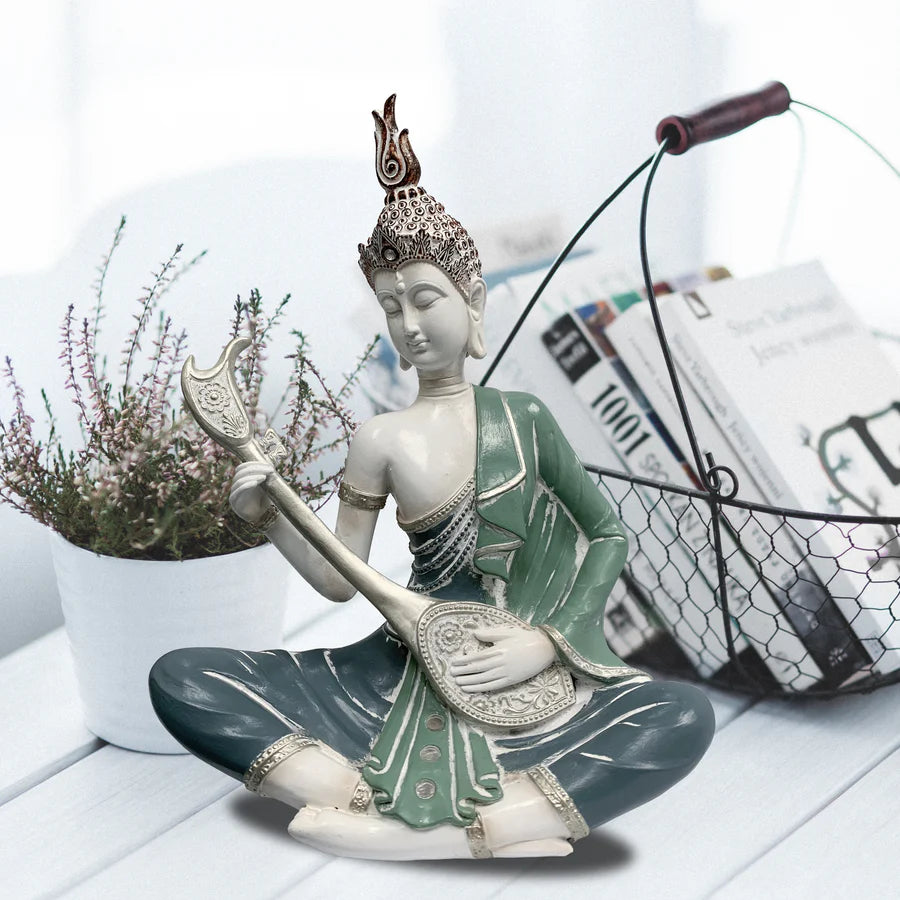 krajappi playing buddha statue